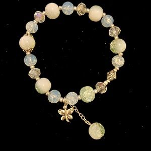 White and blue beaded bracelet with silver butterfly charm jewellery
19cm/7.48in
